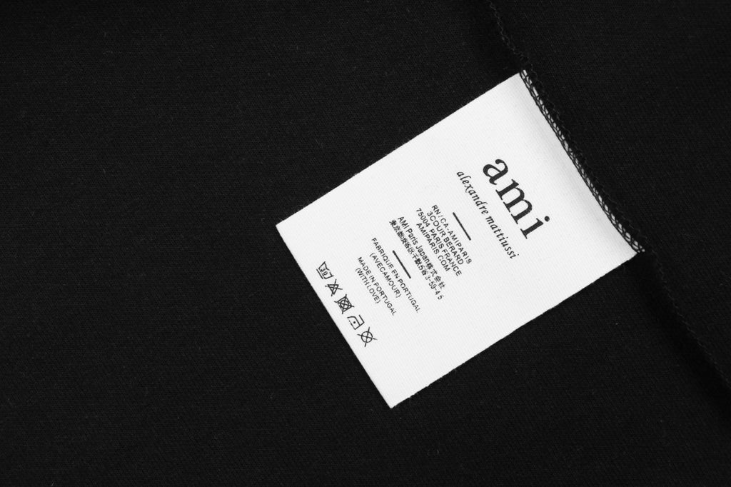 AMI Paris Tonal Heart Texture Relaxed Polo Long Sleeve — Black