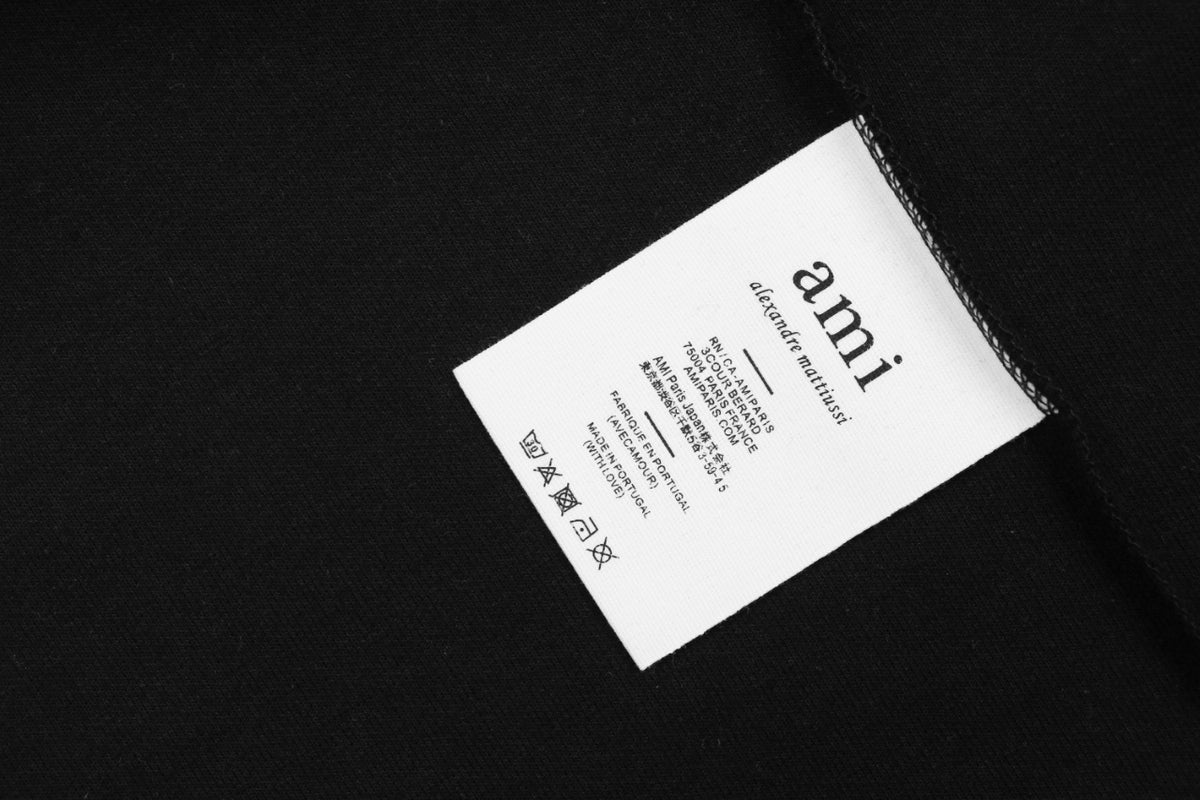 AMI Paris Tonal Heart Texture Relaxed Polo Long Sleeve — Black