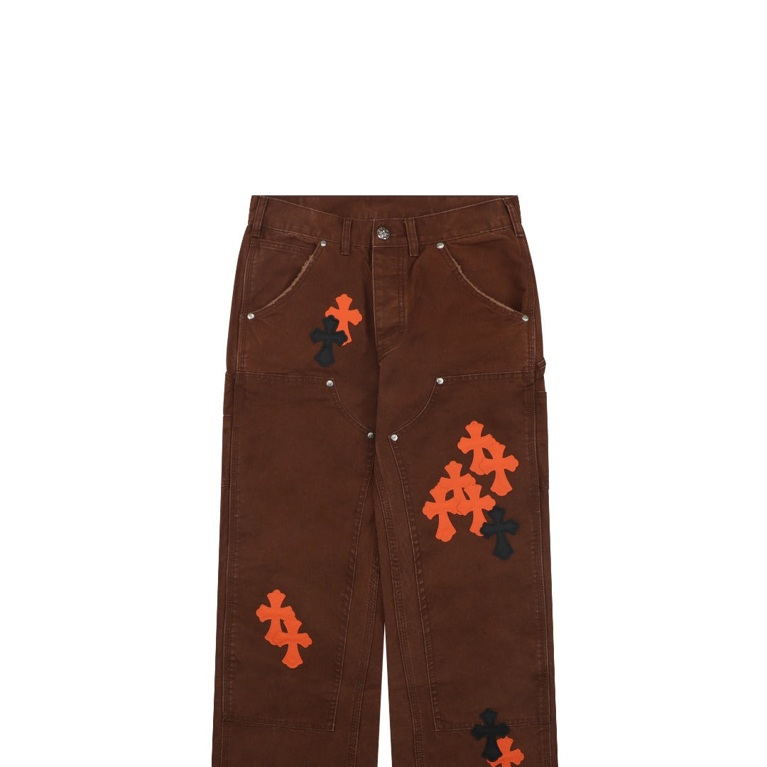Chrome Hearts Cross Leather Patch Logger Denim Jeans — Black Brown