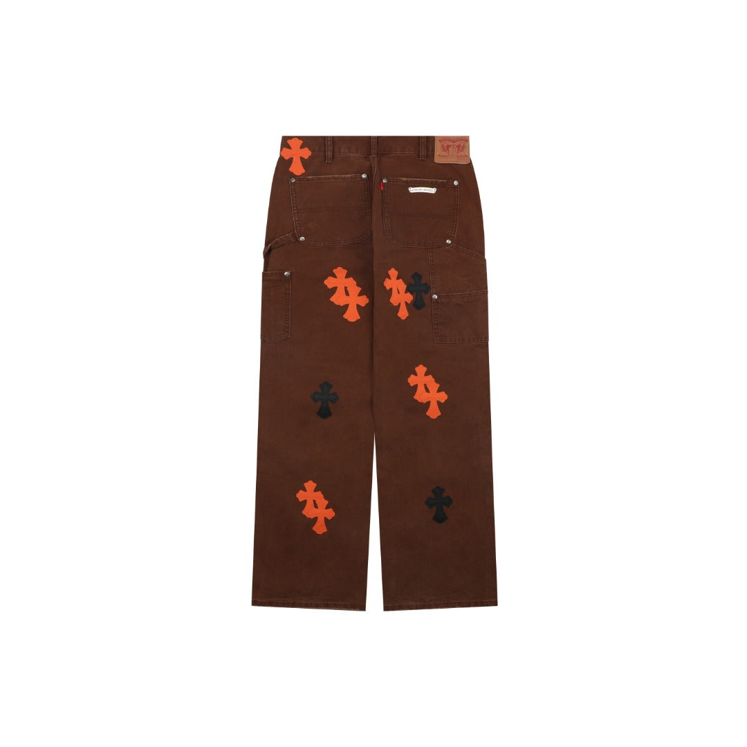 Chrome Hearts Cross Leather Patch Logger Denim Jeans — Black Brown