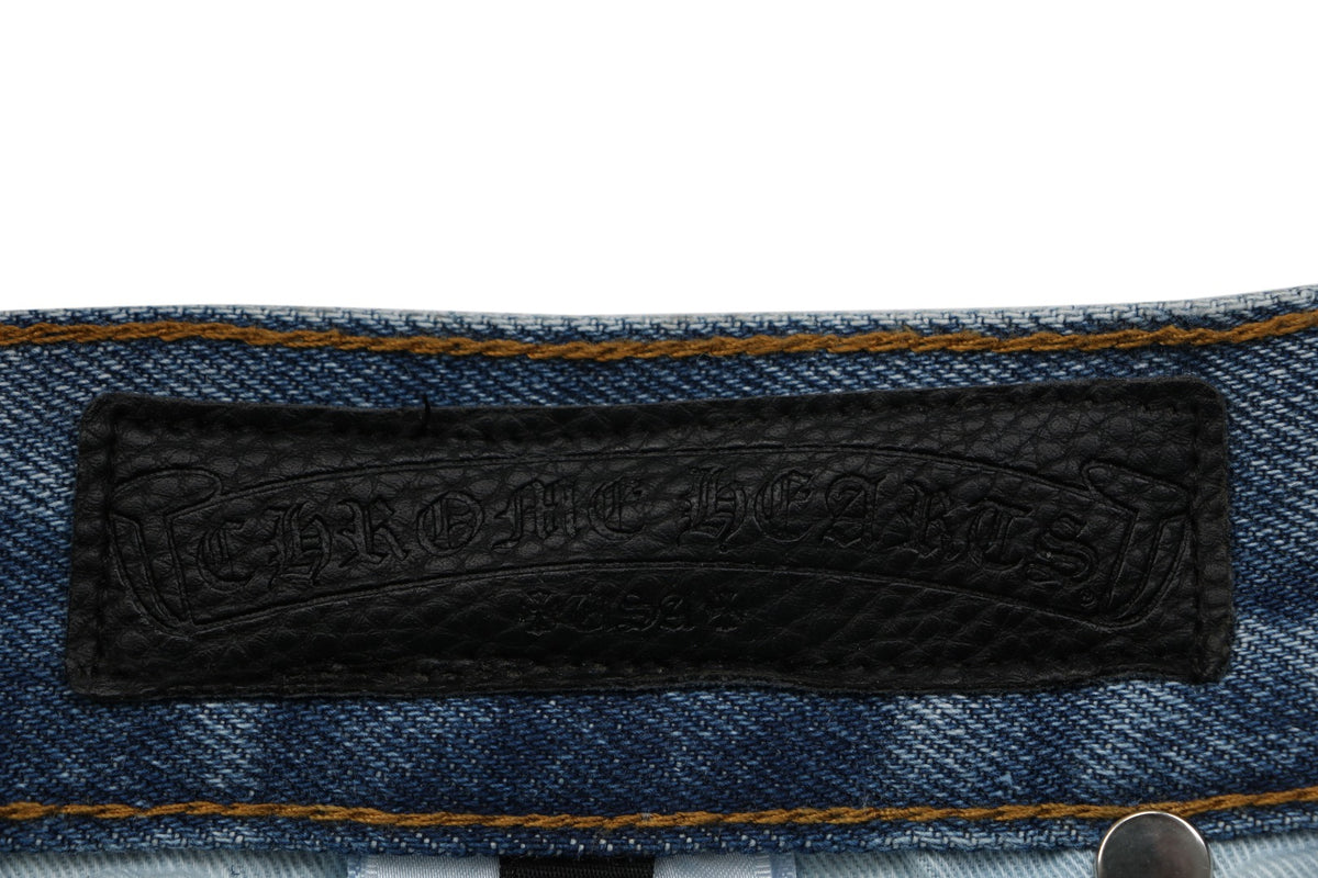 Chrome Hearts Cross Leather Patch Distressed Lumberjack Jeans — Black White Blue