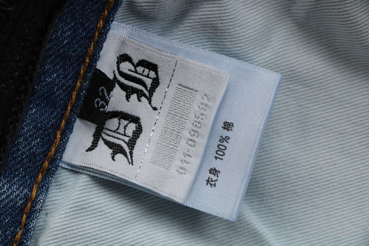 Chrome Hearts Cross Leather Patch Distressed Lumberjack Jeans — Black White Blue