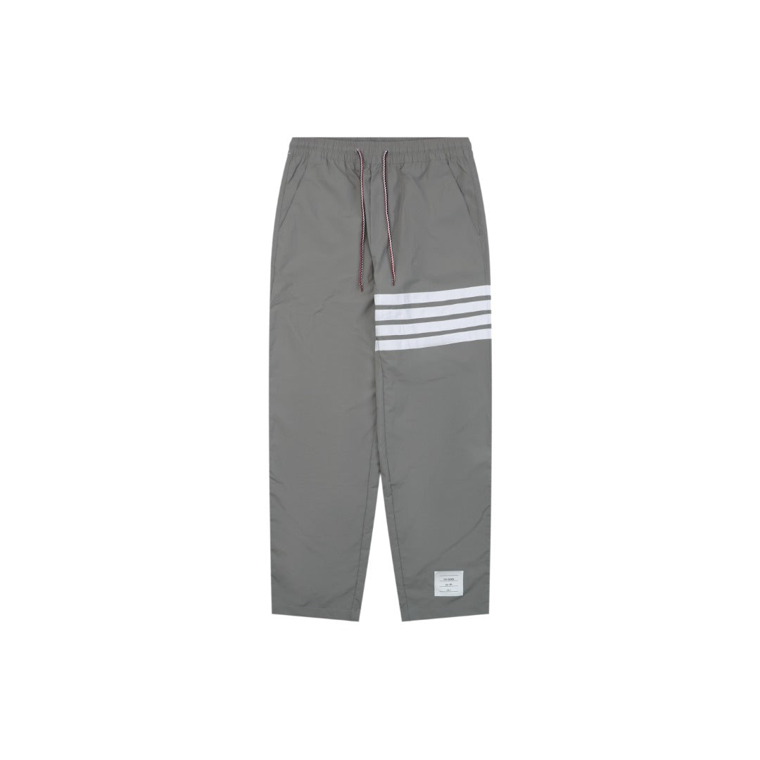 Thom Browne Four-Bar Stripe Drawstring Nylon Track Trousers – Olive Grey