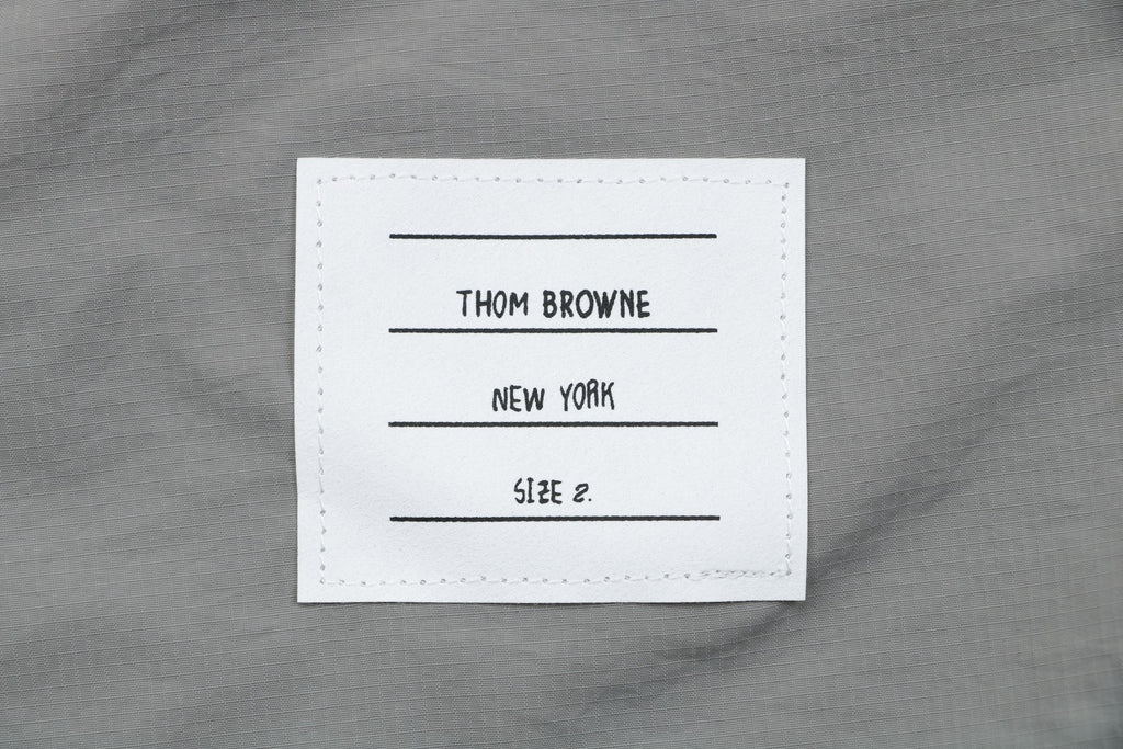 Thom Browne Four-Bar Stripe Drawstring Nylon Track Trousers – Olive Grey