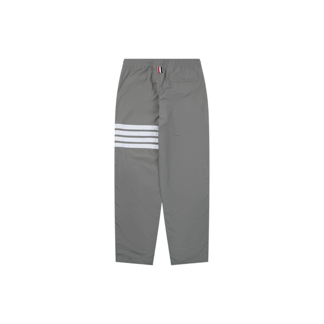 Thom Browne Four-Bar Stripe Drawstring Nylon Track Trousers – Olive Grey