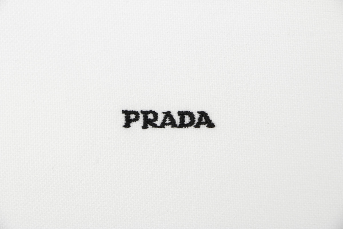 Prada PRADA Chenille Wordmark Badge Embroidered Long Sleeve Shirt – White